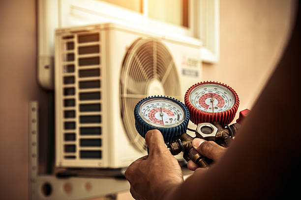 Professional Ac Installation technician working in Montmorenci, IN